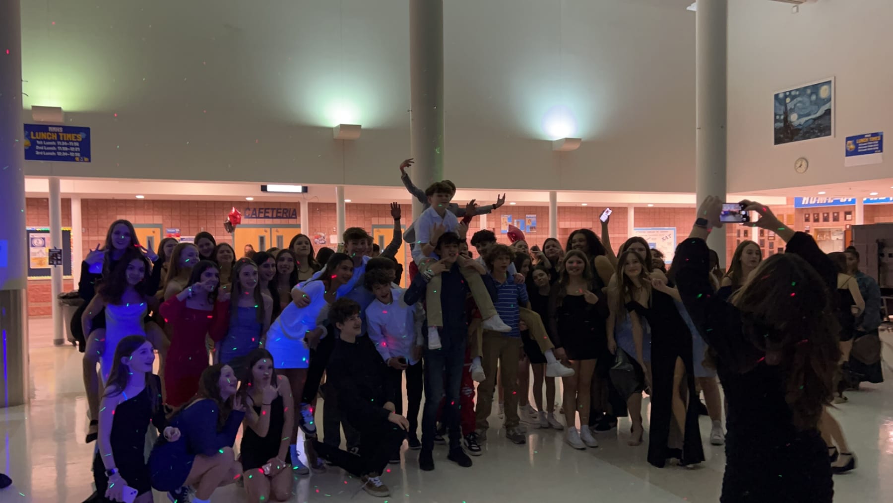 Students gathered together during a Milk Entertainment school dance